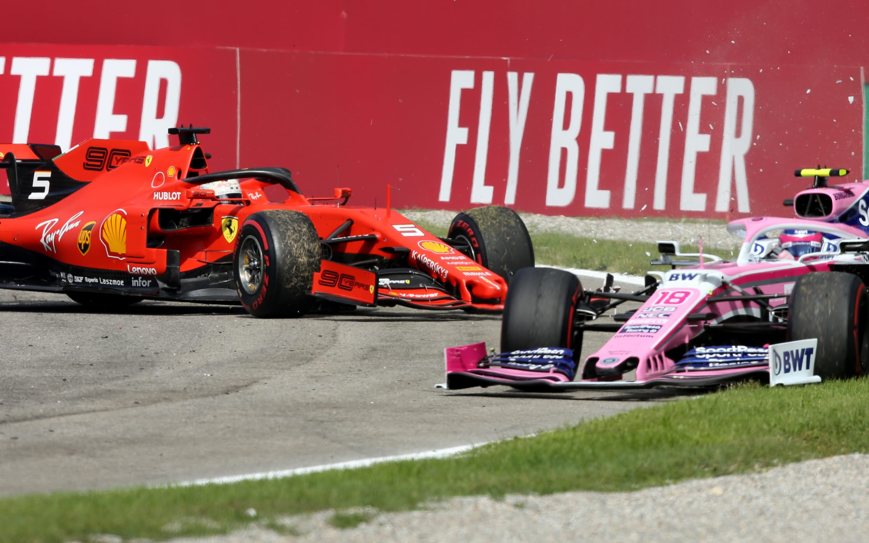 Sebatian Vettel hits Lance Stroll after spinning at Monza 2019.