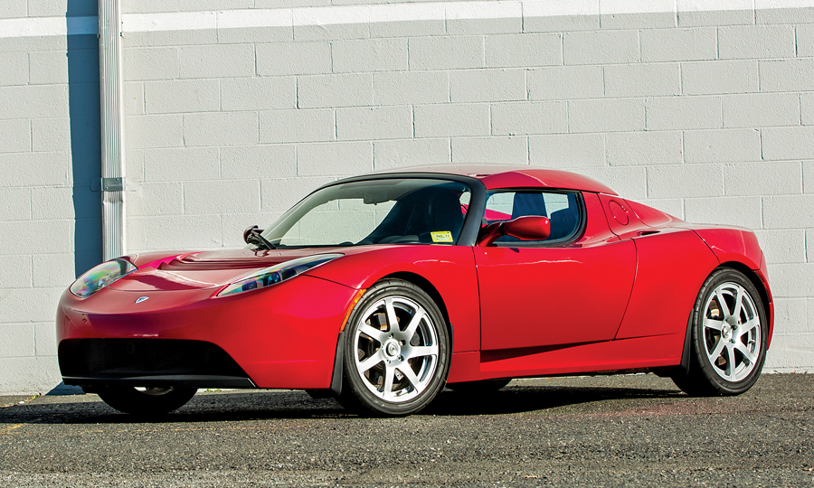 The original Tesla Roadster in red.